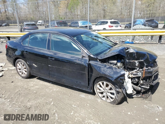 2015 Volkswagen Jetta SE z VIN 3VWD07AJ4FM258784, wystawiony jako Copart lot #51869545 z przebiegiem 125 791 mil mil oraz Szkoda całkowita • Salvage title. Historia ofert i sprzedaży dostępna na DreamBid. Obrazek 4.