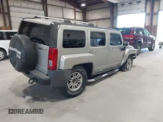2006 Hummer H3 with VIN 5GTDN136268123052, listed as a IAAI auction lot 42126283 with 124,040 mi miles. Bid and sale history available at carsss.com. Image 4.