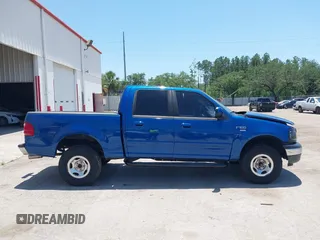 2001 Ford F-150 XLT with VIN 1FTRW07W01KE90204, listed as a IAAI auction lot 42289853 with Not provided miles and . Bid and sale history available at DreamBid. Image 13.