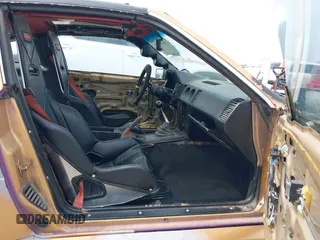 1986 Nissan 300ZX z VIN JN1HZ14S8GX144992, wystawiony jako IAAI lot #42081882 z przebiegiem 127 316 mil mil oraz . Historia ofert i sprzedaży dostępna na DreamBid. Obrazek 5.