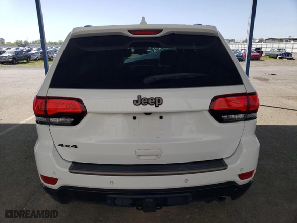 2016 Jeep Grand Cherokee Limited 75th Anniversary with VIN 1C4RJFBG4GC429507, listed as a Copart auction lot 52047165 with 112,843 mi miles and Salvage Title. Bid and sale history available at carsss.com. Image 6.
