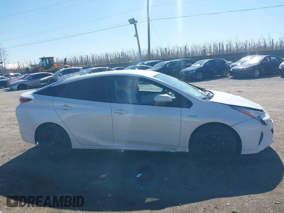 2017 Toyota Prius Two z VIN JTDKARFU4H3053749, wystawiony jako IAAI lot #41816036 z przebiegiem 151 594 mil mil oraz . Historia ofert i sprzedaży dostępna na DreamBid. Obrazek 13.