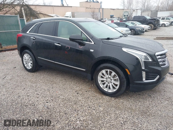 2018 Cadillac XT5 FWD with VIN 1GYKNARS6JZ160993, listed as a IAAI auction lot 41472847 with 113,415 mi miles. Bid and sale history available at carsss.com. Image 1.