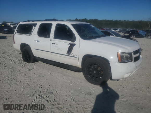 2014 Chevrolet Suburban LTZ with VIN 1GNSCKE02ER105377, listed as a Copart auction lot 76697154 with 229,461 mi miles and Salvage title. Bid and sale history available at DreamBid. Image 6.
