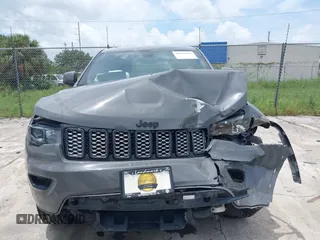 2019 Jeep Grand Cherokee Upland with VIN 1C4RJFAG9KC674720, listed as a IAAI auction lot 40002864 with Not Provided miles and . Bid and sale history available at DreamBid. Image 12.