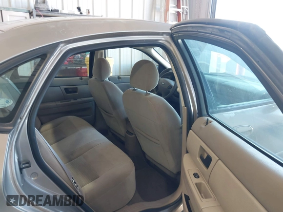 2003 Ford Taurus SE Standard with VIN 1FAFP53U13G229161, listed as a IAAI auction lot 39753697 with 94,195 mi miles. Bid and sale history available at carsss.com. Image 8.