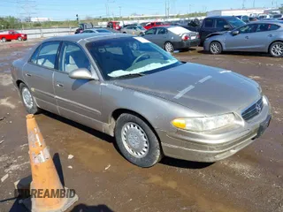 1997 Buick Regal LS with VIN 2G4WB52K9V1435882, listed as a IAAI auction lot 41974673 with 64,402 mi miles. Bid and sale history available at carsss.com. Image 1.