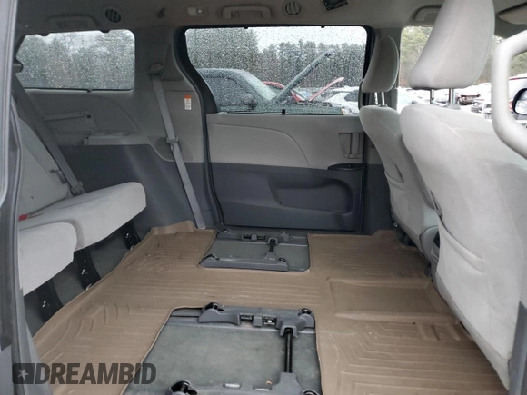2016 Toyota Sienna LE with VIN 5TDJK3DC4GS133341, listed as a Copart auction lot 83660134 with 133,700 mi miles and Salvage Title. Bid and sale history available at carsss.com. Image 11.