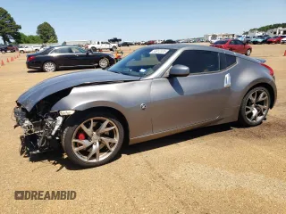 2014 Nissan 370Z Nismo with VIN JN1AZ4EH7EM633324, listed as a Copart auction lot 53812335 with 57,856 mi miles and Salvage Title. Bid and sale history available at DreamBid. Image 1.