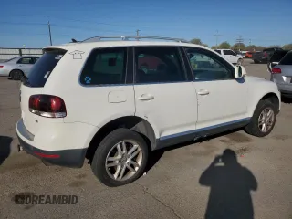 2009 Volkswagen Touareg VR6 z VIN WVGBE77L19D002425, wystawiony jako Copart lot #53116045 z przebiegiem 223 281 mil mil oraz Tytuł czysty. Historia ofert i sprzedaży dostępna na DreamBid. Obrazek 3.