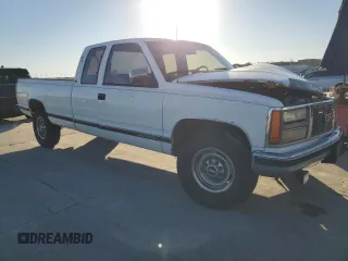 1991 GMC Sierra 1500 with VIN 2GTGC29K3M1532424, listed as a Copart auction lot 86216144 with 173,257 mi miles and Salvage Title. Bid and sale history available at DreamBid. Image 4.