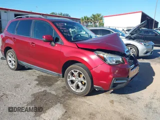 2017 Subaru Forester Touring with VIN JF2SJAWC0HH496073, listed as a IAAI auction lot 41836726 with 151,793 mi miles and . Bid and sale history available at DreamBid. Image 1.