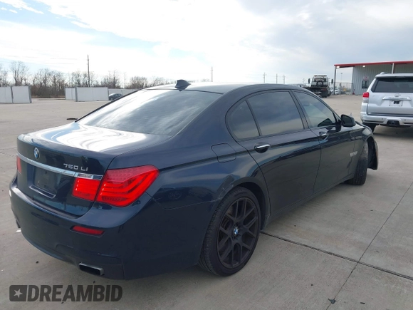 2012 BMW 7 Series 750Li with VIN WBAKB8C50CC963330, listed as a IAAI auction lot 41286275 with 186,335 mi miles. Bid and sale history available at carsss.com. Image 4.