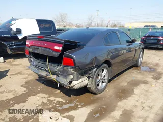 2014 Dodge Charger SXT Plus with VIN 2C3CDXJG0EH104680, listed as a IAAI auction lot 41784303 with 135,771 mi miles. Bid and sale history available at carsss.com. Image 4.