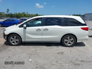 2018 Honda Odyssey EX-L z VIN 5FNRL6H76JB111027, wystawiony jako IAAI lot #42234196 z przebiegiem 88 855 mil mil oraz . Historia ofert i sprzedaży dostępna na DreamBid. Obrazek 15.