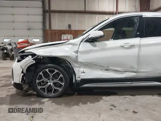 2021 BMW X1 xDrive28i with VIN WBXJG9C04M5T82884, listed as a IAAI auction lot 42242890 with 24,647 mi miles and . Bid and sale history available at DreamBid. Image 6.