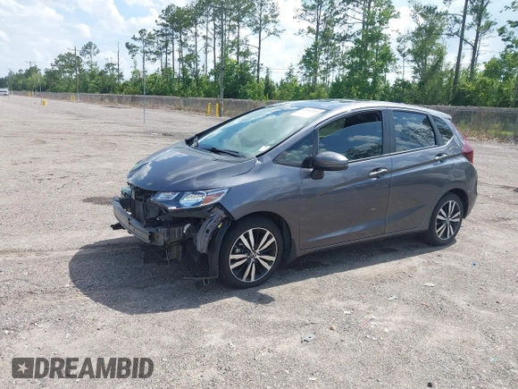 2019 Honda Fit EX z VIN 3HGGK5H89KM736677, wystawiony jako IAAI lot #42443401 z przebiegiem 58 559 mil mil oraz . Historia ofert i sprzedaży dostępna na DreamBid. Obrazek 18.