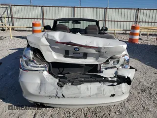 2013 BMW 1 Series 128i with VIN WBAUL7C53DVU09950, listed as a Copart auction lot 77703764 with 94,378 mi miles and Salvage title. Bid and sale history available at DreamBid. Image 6.