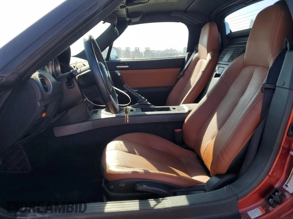 2008 Mazda MX-5 Miata Grand Touring z VIN JM1NC26F780144189, wystawiony jako Copart lot #52204015 z przebiegiem 71 339 mil mil oraz Szkoda całkowita • Salvage title. Historia ofert i sprzedaży dostępna na DreamBid. Obrazek 7.