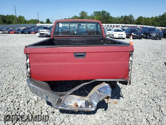 1991 Nissan Frontier XE with VIN 1N6SD11S2MC412375, listed as a Copart auction lot 61015515 with 201,629 mi miles and Salvage title. Bid and sale history available at DreamBid. Image 6.