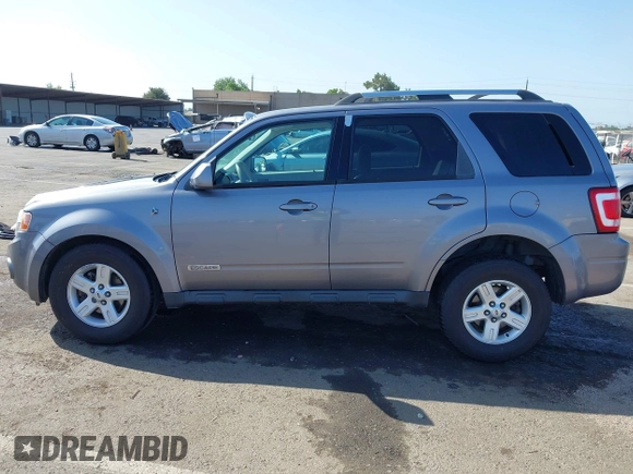 2008 Ford Escape Hybrid z VIN 1FMCU59H08KA05248, wystawiony jako IAAI lot #42193949 z przebiegiem 208 866 mil mil oraz . Historia ofert i sprzedaży dostępna na DreamBid. Obrazek 13.