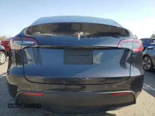 2024 Tesla Model Y with VIN 7SAYGDED7RF056973, listed as a Copart auction lot 55310705 with 15,391 mi miles and Salvage Title. Bid and sale history available at DreamBid. Image 6.