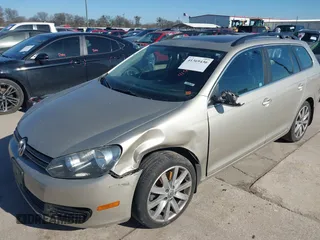 2012 Volkswagen Jetta SportWagen TDI with VIN 3VWPL7AJ8CM696238, listed as a IAAI auction lot 41369436 with 200,070 mi miles. Bid and sale history available at carsss.com. Image 2.