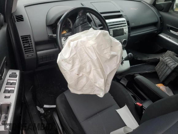 2006 Mazda 5 Touring with VIN JM1CR293860101825, listed as a Copart auction lot 62988265 with 197,786 mi miles and Salvage title. Bid and sale history available at DreamBid. Image 8.