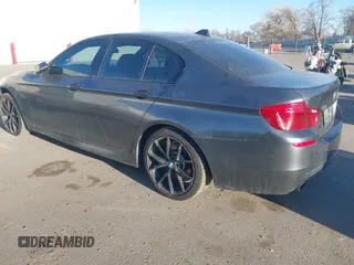 2015 BMW 5 Series 535i xDrive with VIN WBA5B3C58FD547704, listed as a IAAI auction lot 41764129 with 152,649 mi miles. Bid and sale history available at carsss.com. Image 3.