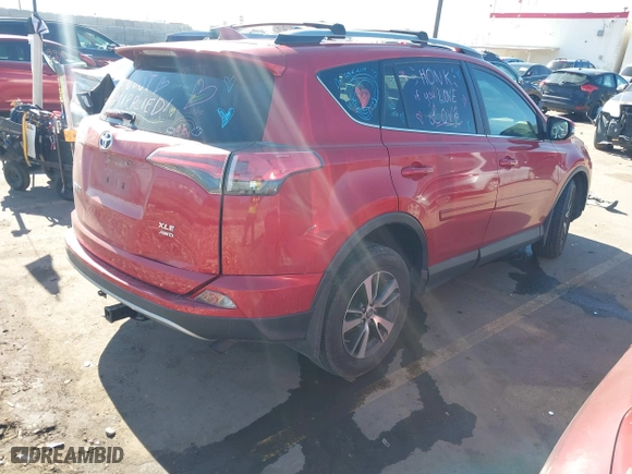2017 Toyota RAV4 XLE with VIN 2T3RFREV5HW684792, listed as a IAAI auction lot 41692376 with 125,511 mi miles. Bid and sale history available at carsss.com. Image 4.
