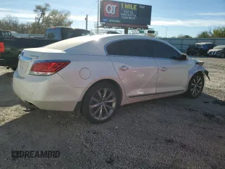 2013 Buick LaCrosse Premium 1 с VIN 1G4GG5E35DF229881, выставлен на аукционе Copart как лот 81287064 с пробегом 122 635 миль миль и Списание • Salvage title. История ставок и продаж доступна на DreamBid. Изображение 3.