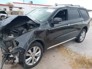 2013 Dodge Durango Crew with VIN 1C4RDHDG1DC647447, listed as a IAAI auction lot 42237714 with 177,523 mi miles and . Bid and sale history available at DreamBid. Image 2.