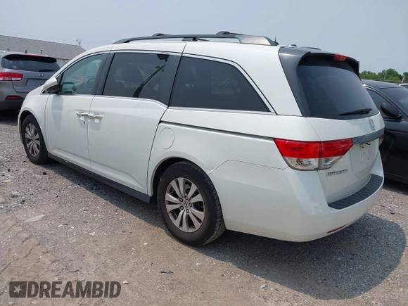 2014 Honda Odyssey EX-L with VIN 5FNRL5H62EB109573, listed as a IAAI auction lot 42387637 with 208,061 mi miles and . Bid and sale history available at DreamBid. Image 3.