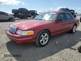 2003 Ford Crown Victoria LX z VIN 2FAFP74W43X100336, wystawiony jako Copart lot #51004035 z przebiegiem 82 089 mil mil oraz Szkody całkowita. Historia ofert i sprzedaży dostępna na DreamBid. Obrazek 1.