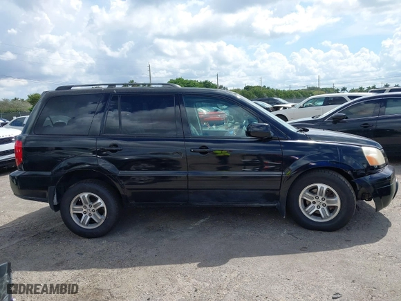2005 Honda Pilot EX-L with NAVI with VIN 2HKYF18715H562492, listed as a IAAI auction lot 41627194 with 184,653 mi miles. Bid and sale history available at carsss.com. Image 13.