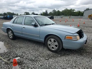 2011 Ford Crown Victoria LX z VIN 2FABP7EV3BX170123, wystawiony jako Copart lot #58020205 z przebiegiem 139 303 mil mil oraz Szkoda całkowita • Salvage title. Historia ofert i sprzedaży dostępna na DreamBid. Obrazek 4.
