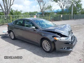 2016 Ford Fusion Energi SE Luxury with VIN 3FA6P0PU2GR322122, listed as a IAAI auction lot 41956798 with 102,632 mi miles. Bid and sale history available at carsss.com. Image 1.