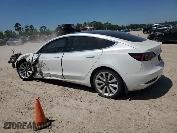 2020 Tesla Model 3 Standard Range Plus with VIN 5YJ3E1EA5LF599280, listed as a Copart auction lot 52383295 with 58,506 mi miles and Salvage Title. Bid and sale history available at DreamBid. Image 2.