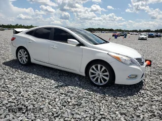 2013 Hyundai Azera z VIN KMHFH4JG4DA310590, wystawiony jako Copart lot #62472335 z przebiegiem 75 311 mil mil oraz Nie do naprawy • Non repairable. Historia ofert i sprzedaży dostępna na DreamBid. Obrazek 4.