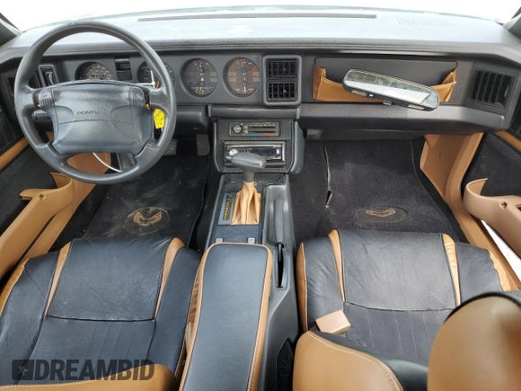 1991 Pontiac Firebird z VIN 1G2FS23T9ML201636, wystawiony jako Copart lot #53856725 z przebiegiem 1 278 739 mil mil oraz Czysty tytuł • Clean title. Historia ofert i sprzedaży dostępna na DreamBid. Obrazek 8.
