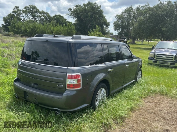 2016 Ford Flex SEL z VIN 2FMGK5C83GBA09724, wystawiony jako Copart lot #59036745 z przebiegiem 188 103 mil mil oraz Tytuł czysty. Historia ofert i sprzedaży dostępna na DreamBid. Obrazek 4.