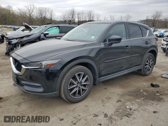 2017 Mazda CX-5 Grand Touring with VIN JM3KFBDL7H0204658, listed as a Copart auction lot 54007165 with 154,546 mi miles and Salvage Title. Bid and sale history available at carsss.com. Image 1.