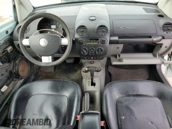 2004 Volkswagen Beetle with VIN 3VWCM21Y64M310431, listed as a Copart auction lot 82449604 with 166,974 mi miles and Salvage Title. Bid and sale history available at DreamBid. Image 8.