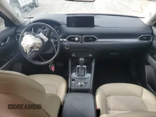 2021 Mazda CX-5 Touring with VIN JM3KFACM7M0334633, listed as a Copart auction lot 51618875 with 70,558 mi miles and Salvage Title. Bid and sale history available at DreamBid. Image 8.