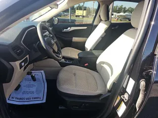 2020 Ford Escape SE with VIN 1FMCU0G60LUA31950, listed as a IAAI auction lot 42241218 with 57,693 mi miles and . Bid and sale history available at carsss.com. Image 3.