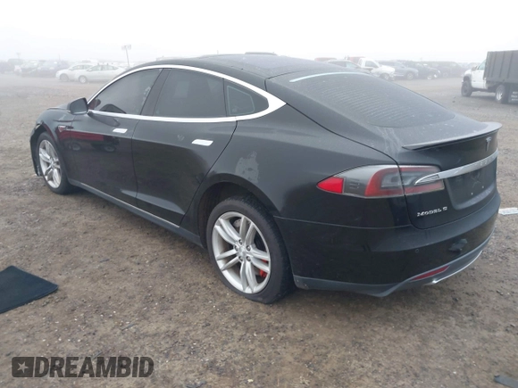 2014 Tesla Model S 60 with VIN 5YJSA1H1XEFP36008, listed as a IAAI auction lot 41287240 with 48,171 mi miles and . Bid and sale history available at DreamBid. Image 3.