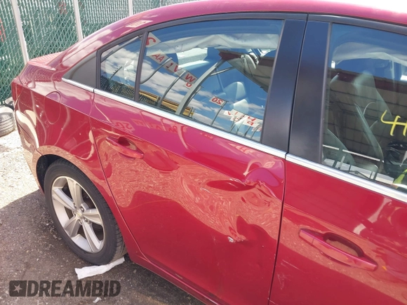 2014 Chevrolet Cruze 2LT z VIN 1G1PE5SB2E7123236, wystawiony jako IAAI lot #41882768 z przebiegiem 123 311 mil mil oraz . Historia ofert i sprzedaży dostępna na DreamBid. Obrazek 18.