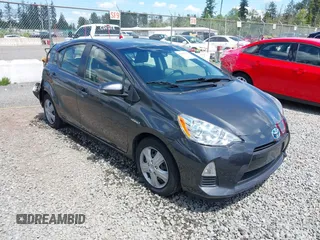 2014 Toyota Prius One z VIN JTDKDTB36E1563626, wystawiony jako IAAI lot #42315724 z przebiegiem 147 459 mil mil oraz . Historia ofert i sprzedaży dostępna na DreamBid. Obrazek 1.