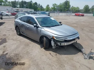 2020 Honda Insight Touring z VIN 19XZE4F94LE003419, wystawiony jako IAAI lot #42108510 z przebiegiem 95 624 mil mil oraz . Historia ofert i sprzedaży dostępna na DreamBid. Obrazek 1.