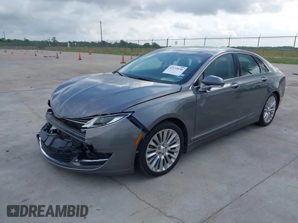 2014 Lincoln MKZ z VIN 3LN6L2G99ER834840, wystawiony jako IAAI lot #42134656 z przebiegiem 33 565 mil mil oraz . Historia ofert i sprzedaży dostępna na DreamBid. Obrazek 2.